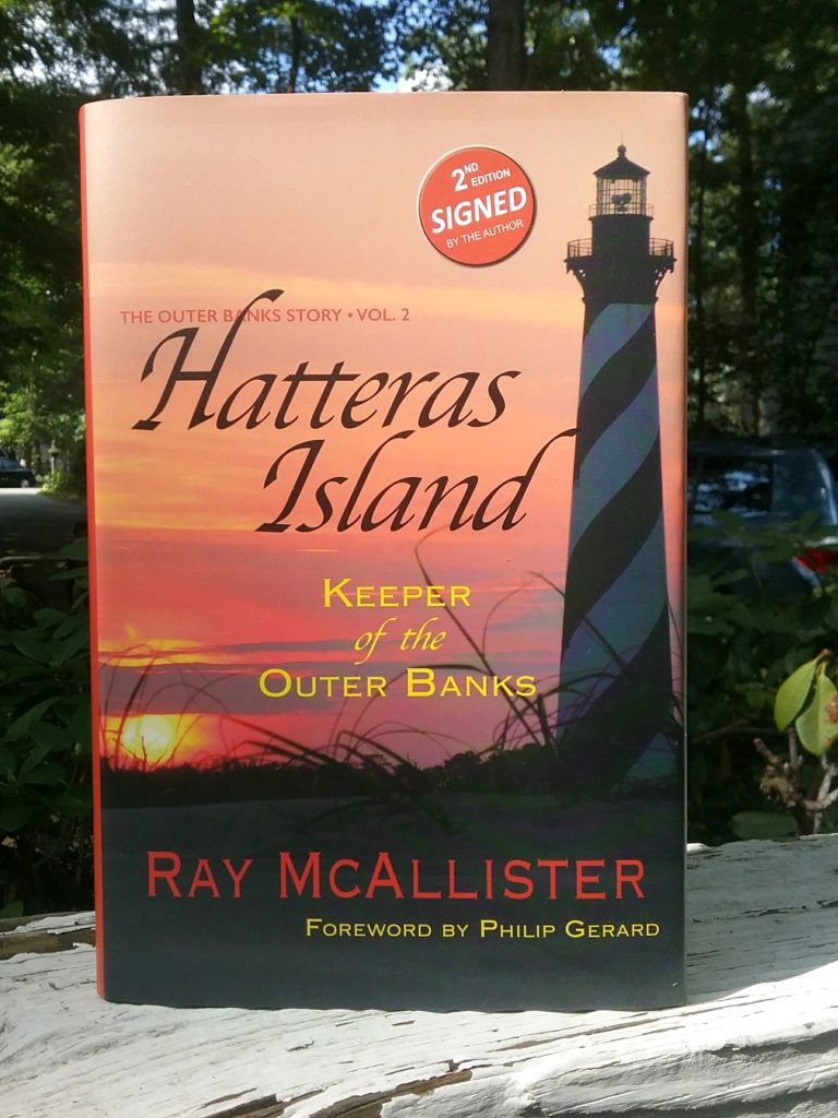 A book cover with a lighthouse and the words " hatteras island keeper of the outer banks ".